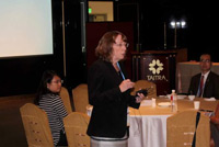Katherine Ferrara presenting at the WIE luncheon